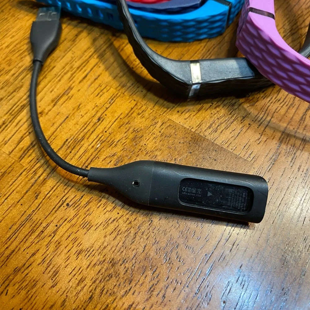 Silicone replacement bands for Fitbit. And charger.